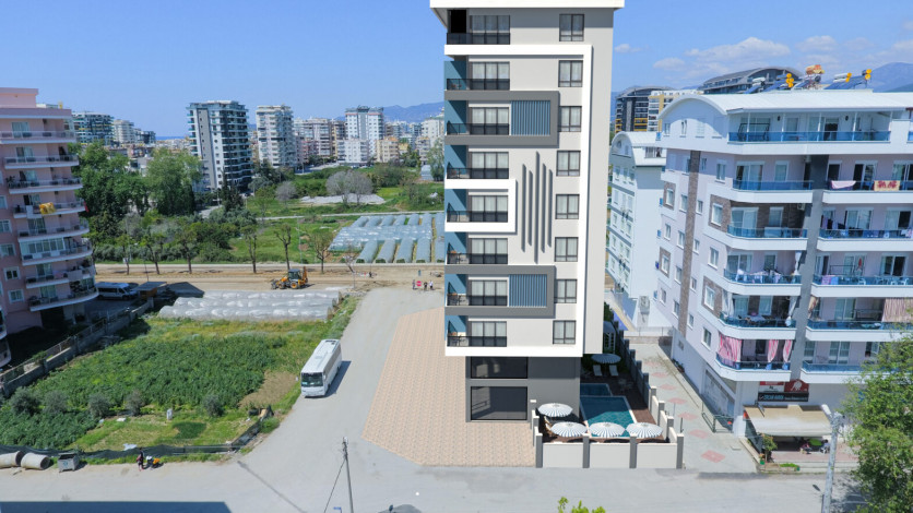 Новая квартира планировки 1+1, 60м2 в районе Махмутлар - Ракурс 19