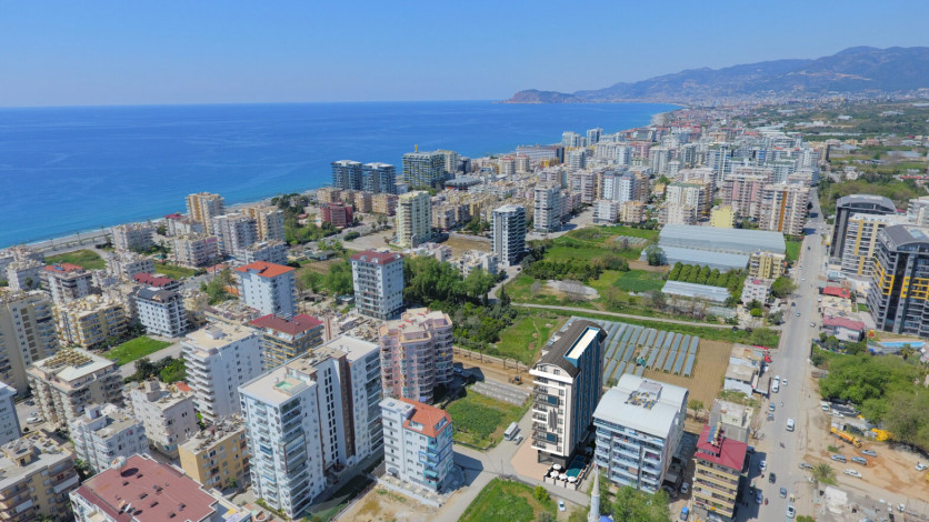 Новая квартира планировки 1+1, 60м2 в районе Махмутлар - Ракурс 26