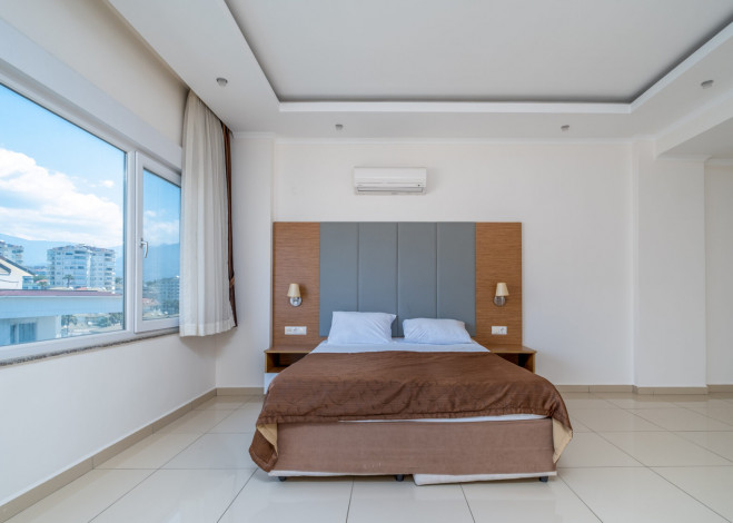 Апартаменты планировки 1+1, 2+1 3+1, 4+1 в районе Джикджилли - Ракурс 20