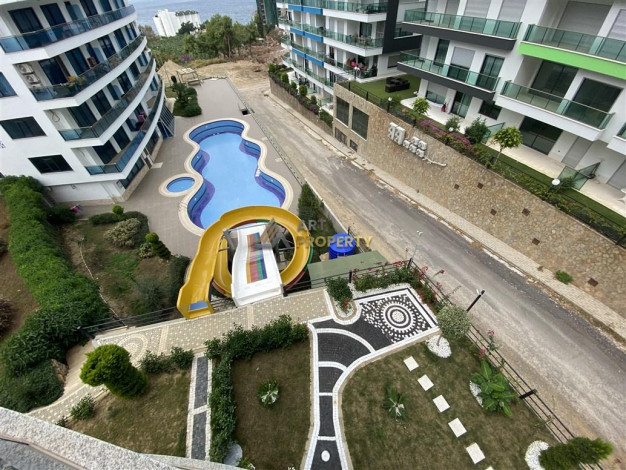 Трехкомнатная меблированная квартира в 200 метрах от моря, Каргыджак, Алания, 100 м2. - Ракурс 19