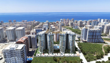 Апартаменты планировки 1+1, 58м2 в ЖК на стадии строительства, район Махмутлар - Ракурс 23