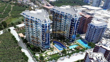 Апартаменты планировки 1+1, 58м2 в ЖК на стадии строительства, район Махмутлар - Ракурс 26