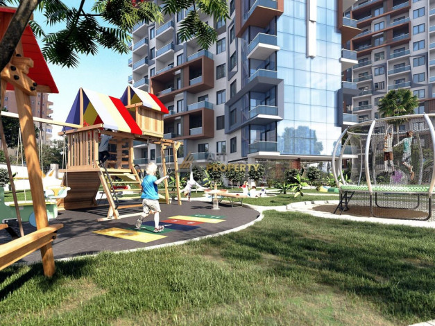 Апартаменты планировки 1+1, 58м2 в ЖК на стадии строительства, район Махмутлар - Ракурс 27