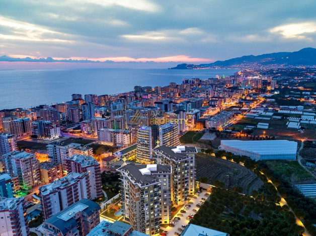 Апартаменты планировки 1+1, 58м2 в ЖК на стадии строительства, район Махмутлар - Ракурс 41