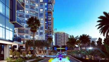 Апартаменты планировки 1+1, 58м2 в ЖК на стадии строительства, район Махмутлар - Ракурс 49