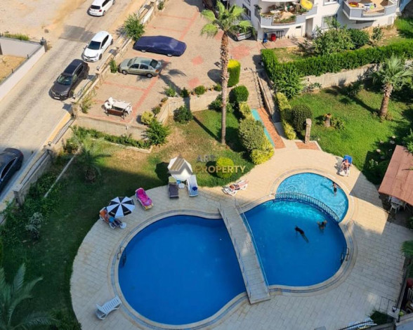 Меблированная квартира планировки 1+1, 55м2 в популярном ЖК, Махмутлар - Ракурс 13