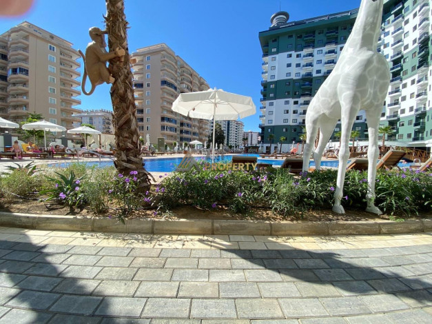 Меблированная квартира планировки 1+1, 55м2 в популярном ЖК, Махмутлар - Ракурс 32