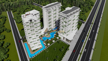 Апартаменты планировки 1+1, 53м2 в ЖК на стадии строительства, район Махмутлар - Ракурс 10