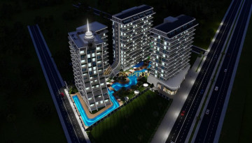 Апартаменты планировки 1+1, 53м2 в ЖК на стадии строительства, район Махмутлар - Ракурс 21