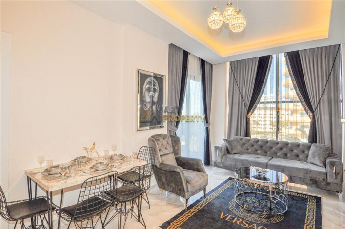 Меблированная квартира планировки 1+1, 60м2 в районе Каргыджак - Ракурс 24