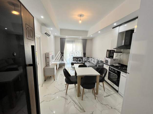 Апартаменты планировки 1+1, 55м2 в ЖК, центр Алании - Ракурс 6