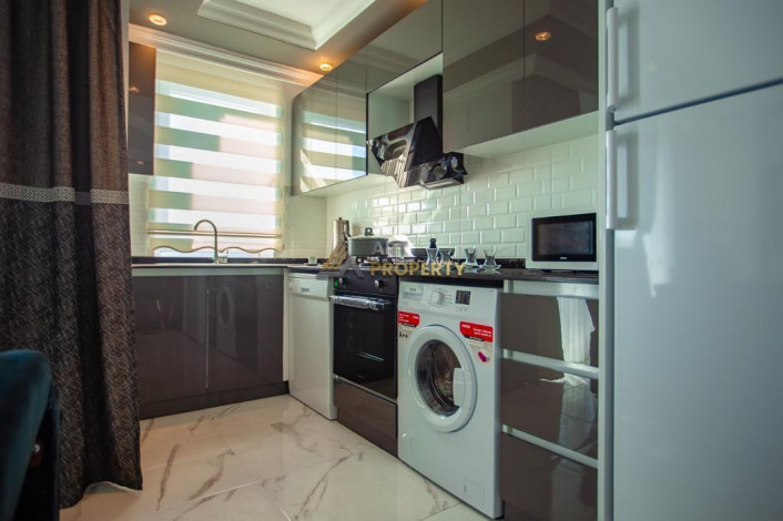 Трехкомнатная квартира с роскошной мебелью и видом на Торосские горы в районе Махмутлар, 75 м2 - Ракурс 12