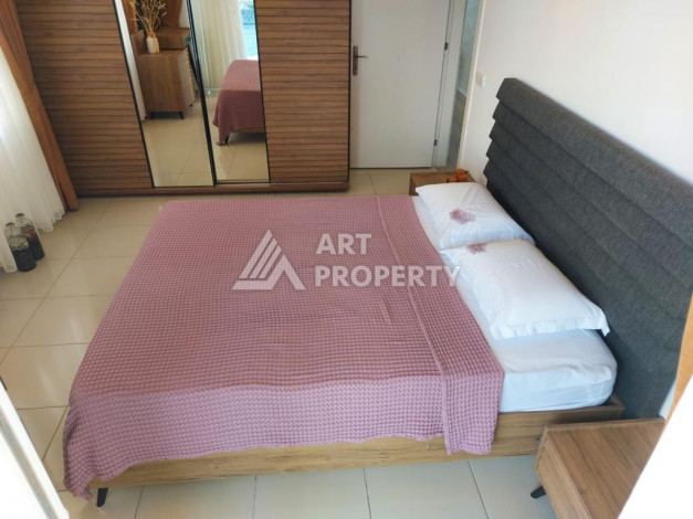 Меблированная квартира планировки 1+1 с большой площадью 70м2, район Махмутлар - Ракурс 7