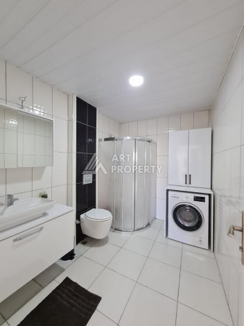 Меблированная квартира планировки 1+1 с большой площадью 70м2, район Махмутлар - Ракурс 8