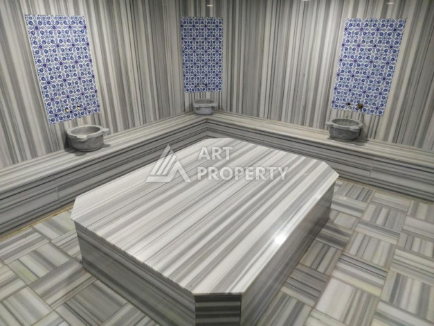 Меблированная квартира планировки 1+1 с большой площадью 70м2, район Махмутлар - Ракурс 17