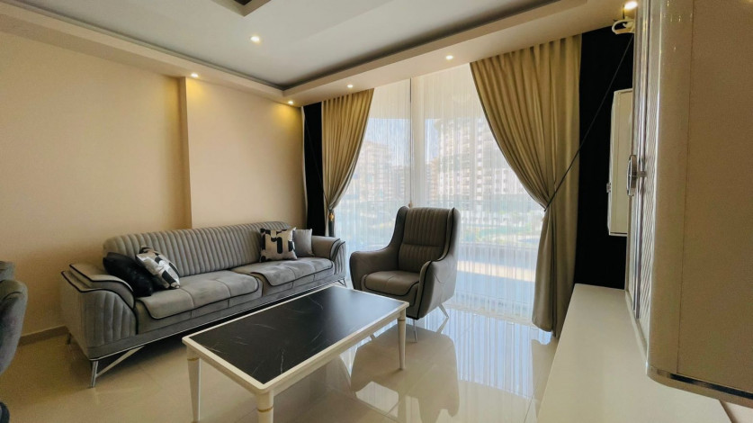 Три меблированные квартиры 1+1 в комплексе с хорошей инфраструктурой в Махмутлар, 60 м2 - Ракурс 2