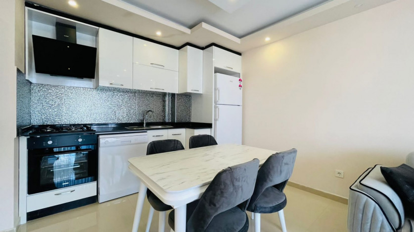 Три меблированные квартиры 1+1 в комплексе с хорошей инфраструктурой в Махмутлар, 60 м2 - Ракурс 4