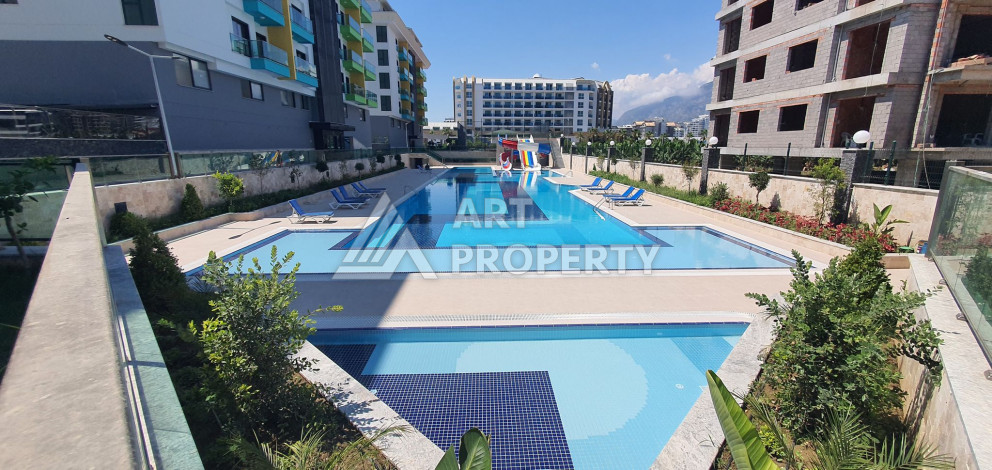 Квартира планировки 1+1,  50м2 в районе Каргыджак - Ракурс 11