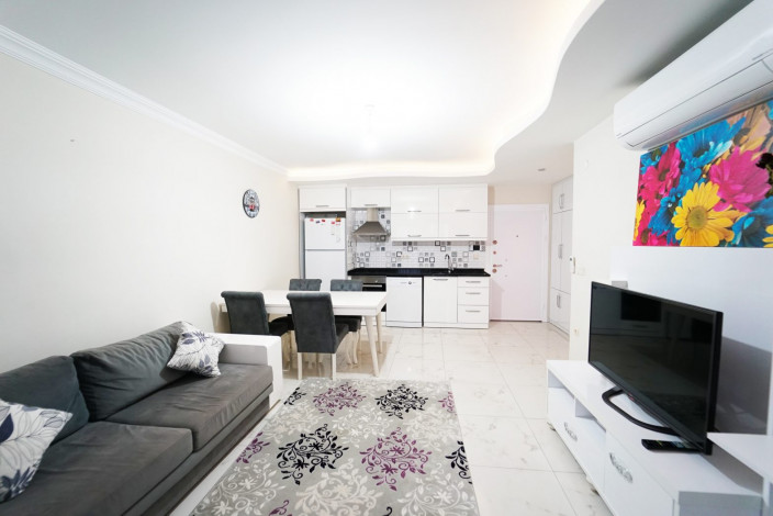 Квартира 1+1 с мебелью в самом центре Махмутлара, 60 м2 - Ракурс 2