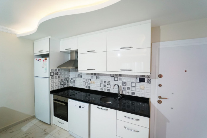 Квартира 1+1 с мебелью в самом центре Махмутлара, 60 м2 - Ракурс 4