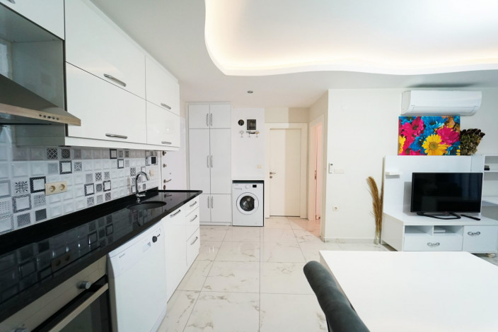 Квартира 1+1 с мебелью в самом центре Махмутлара, 60 м2 - Ракурс 6