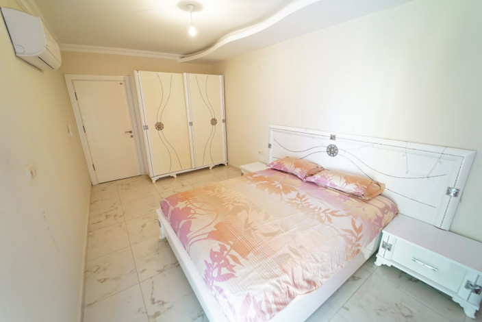 Квартира 1+1 с мебелью в самом центре Махмутлара, 60 м2 - Ракурс 9