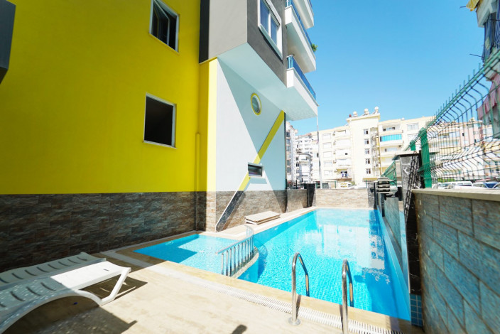 Квартира 1+1 с мебелью в самом центре Махмутлара, 60 м2 - Ракурс 23