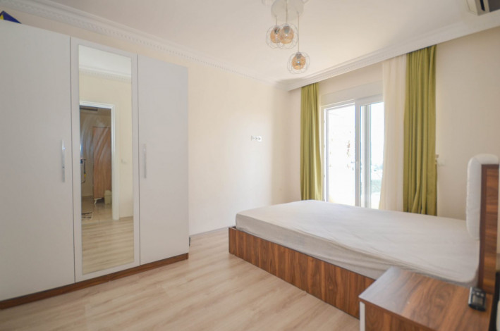 Квартира 2+1 с частичным видом на море в Махмутларе, 115 м2 - Ракурс 15