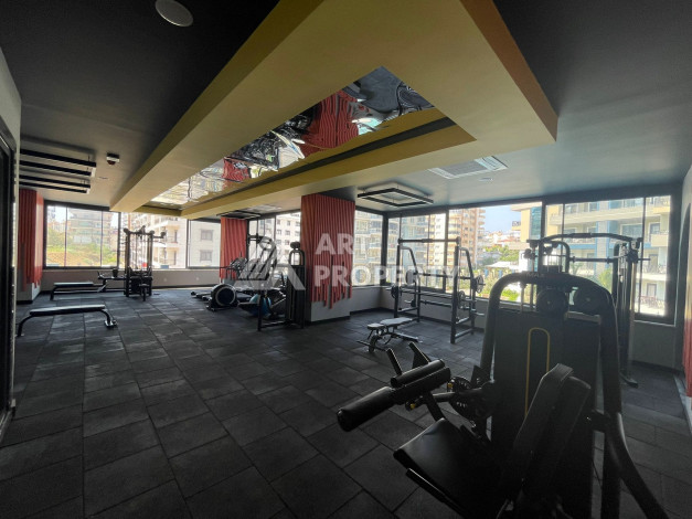 Апартаменты планировки 1+1, 57м2 в районе Махмутлар - Ракурс 10