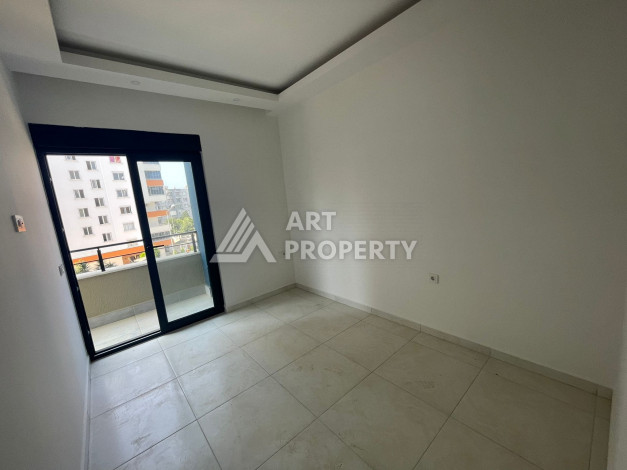 Апартаменты планировки 1+1, 57м2 в районе Махмутлар - Ракурс 18