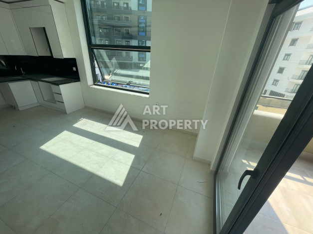 Апартаменты планировки 1+1, 57м2 в районе Махмутлар - Ракурс 19