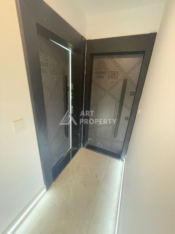 Апартаменты планировки 1+1, 57м2 в районе Махмутлар - Ракурс 24