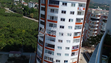 Апартаменты планировки 1+1, 65м2 в районе Махмутлар - Ракурс 1