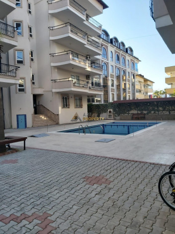 Квартира в 2+1 вблизи от моря в перспективном районе Оба города Аланья, 100 м2 - Ракурс 21