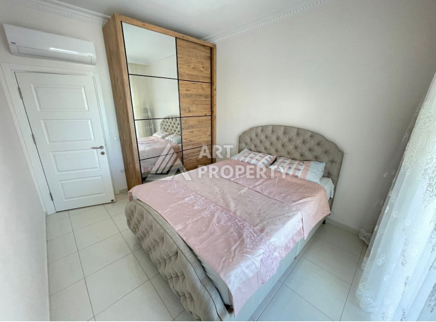 Меблированные апартаменты планировки 1+1, 75м2 в районе Махмутлар - Ракурс 26