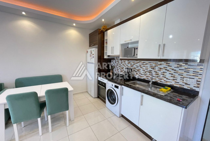 Меблированные апартаменты планировки 1+1, 75м2 в районе Махмутлар - Ракурс 27