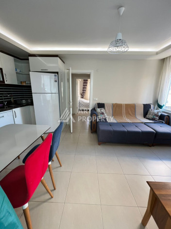 Полностью укомплектованная квартира 1+1 в Махмутларе, 60 м2 - Ракурс 4