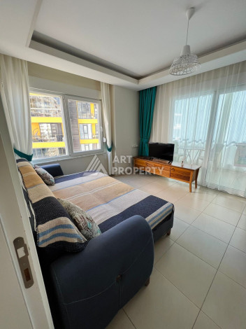 Полностью укомплектованная квартира 1+1 в Махмутларе, 60 м2 - Ракурс 6