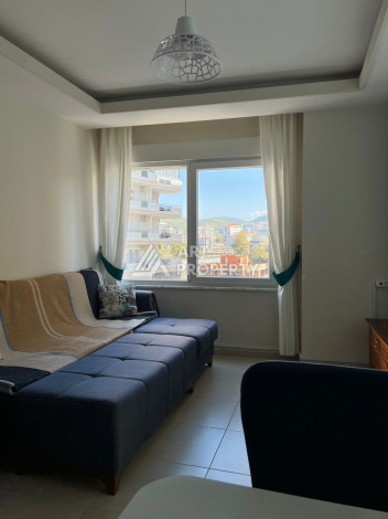 Полностью укомплектованная квартира 1+1 в Махмутларе, 60 м2 - Ракурс 8