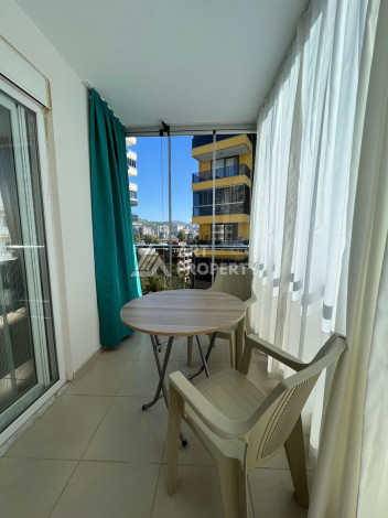 Полностью укомплектованная квартира 1+1 в Махмутларе, 60 м2 - Ракурс 13