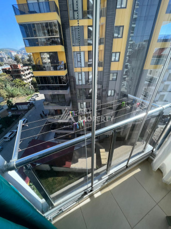 Полностью укомплектованная квартира 1+1 в Махмутларе, 60 м2 - Ракурс 16