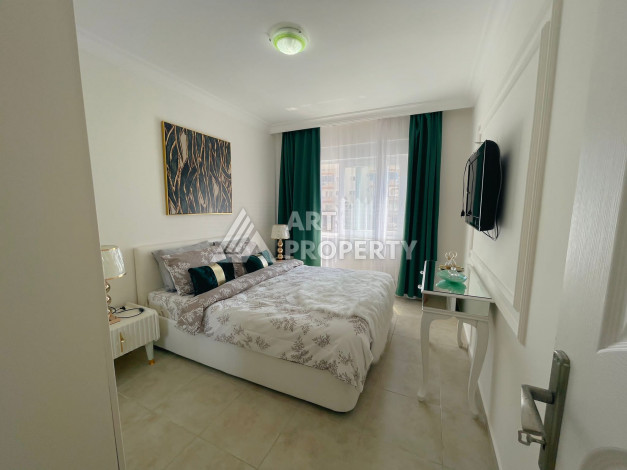 Меблированные апартаменты планировки 1+1, 65м2 в районе Махмутлар - Ракурс 4