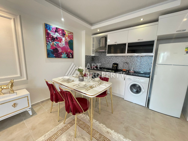 Меблированные апартаменты планировки 1+1, 65м2 в районе Махмутлар - Ракурс 14