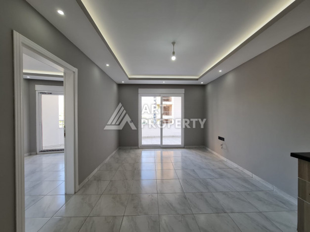 Апартаменты  без мебели в районе Махмутлар с планировкой 1+1, 65м2 - Ракурс 3