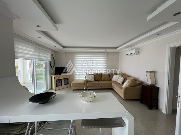 Апартаменты на высоком этаже с планировкой 1+1 в районе Махмутлар,75м2 - Ракурс 2