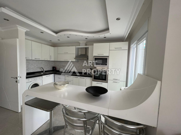 Апартаменты на высоком этаже с планировкой 1+1 в районе Махмутлар,75м2 - Ракурс 3