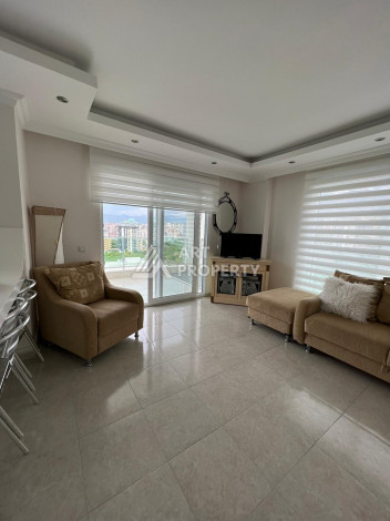 Апартаменты на высоком этаже с планировкой 1+1 в районе Махмутлар,75м2 - Ракурс 5