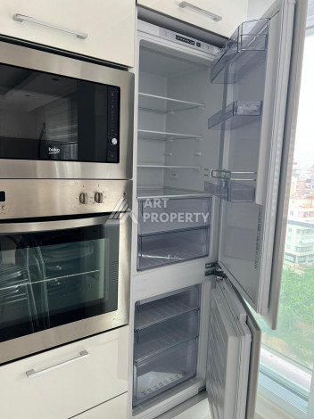 Апартаменты на высоком этаже с планировкой 1+1 в районе Махмутлар,75м2 - Ракурс 10