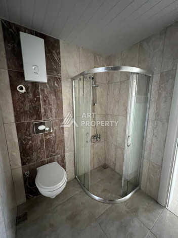 Апартаменты на высоком этаже с планировкой 1+1 в районе Махмутлар,75м2 - Ракурс 11