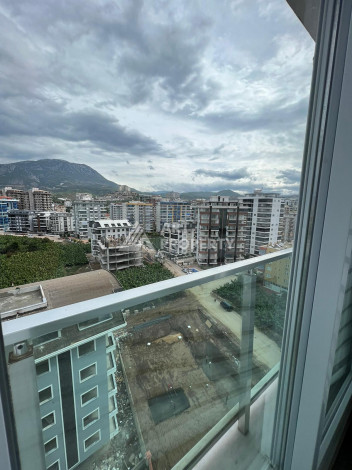 Апартаменты на высоком этаже с планировкой 1+1 в районе Махмутлар,75м2 - Ракурс 12